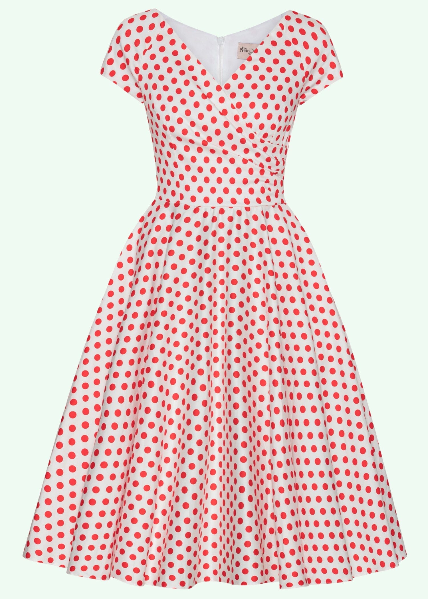 Hourglass swing dress in white with red polka dots from Pretty Dress Company Hourglass swing dress in white with red polka dots from Pretty Dress Company
