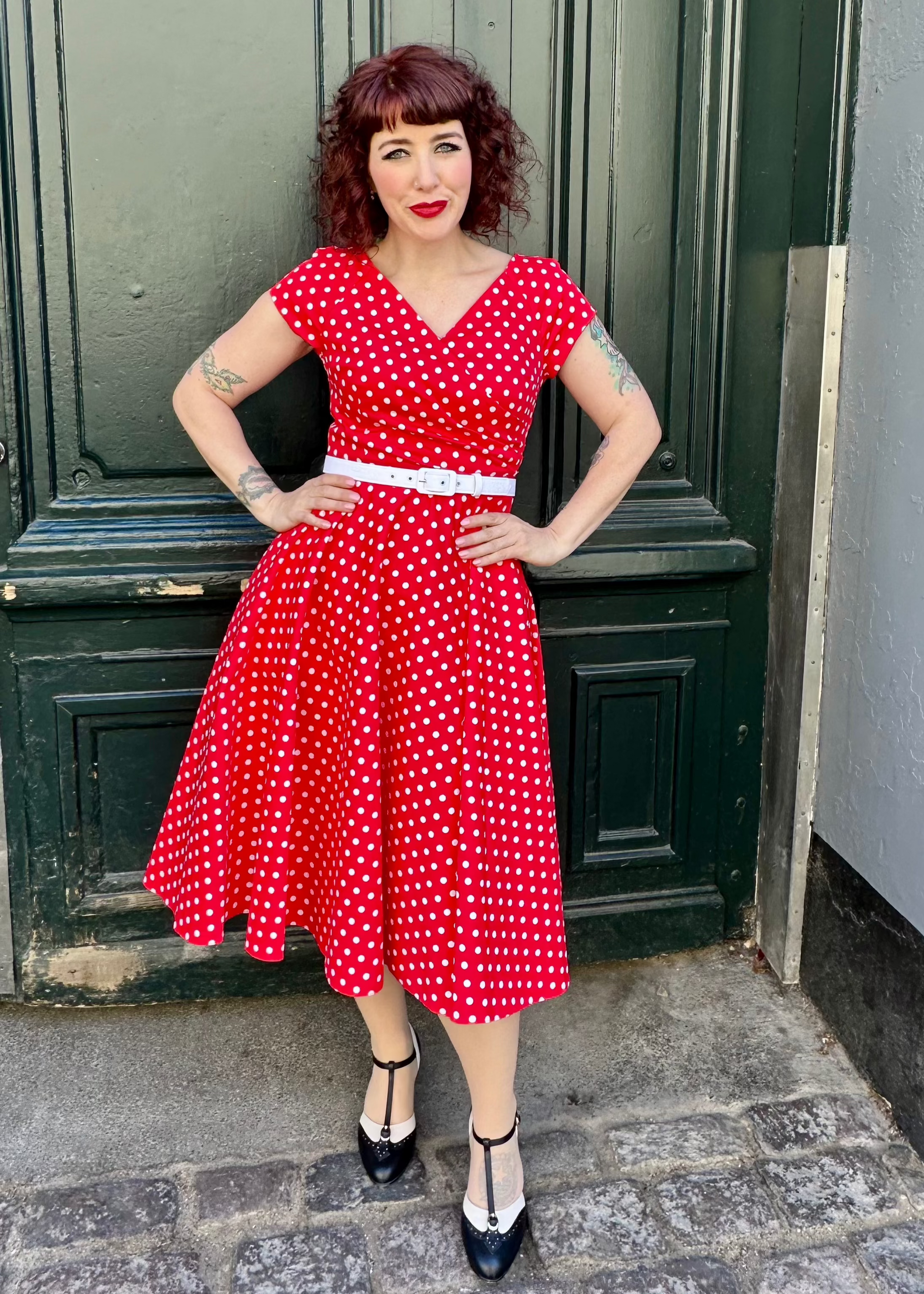 Hourglass swing dress in white with red polka dots from Pretty Dress Company