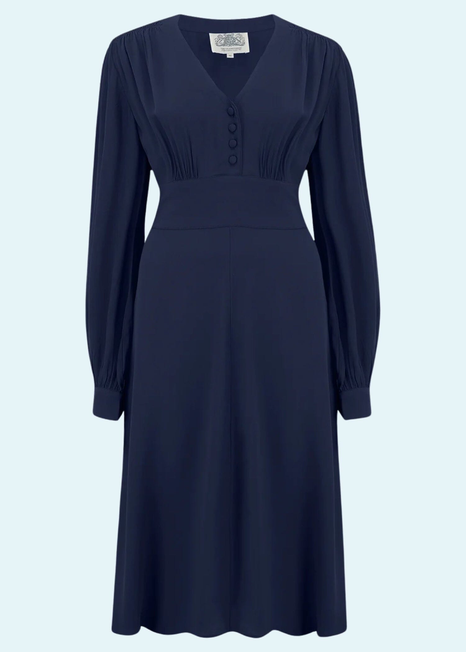 Simple vintage style 1940s dress in navy blue