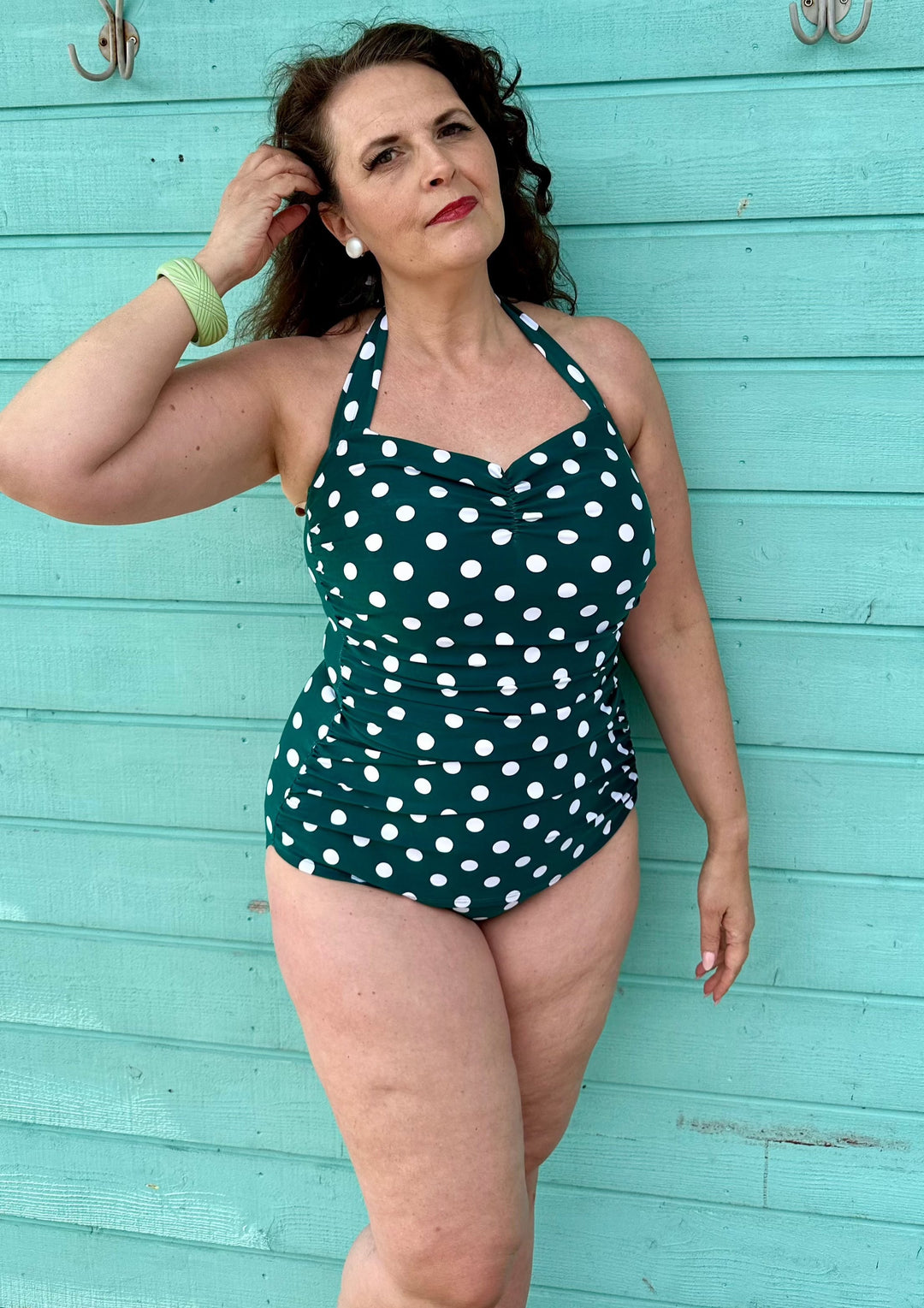 Green 50 s swimsuit with white dots from Esther Williams Swimwear