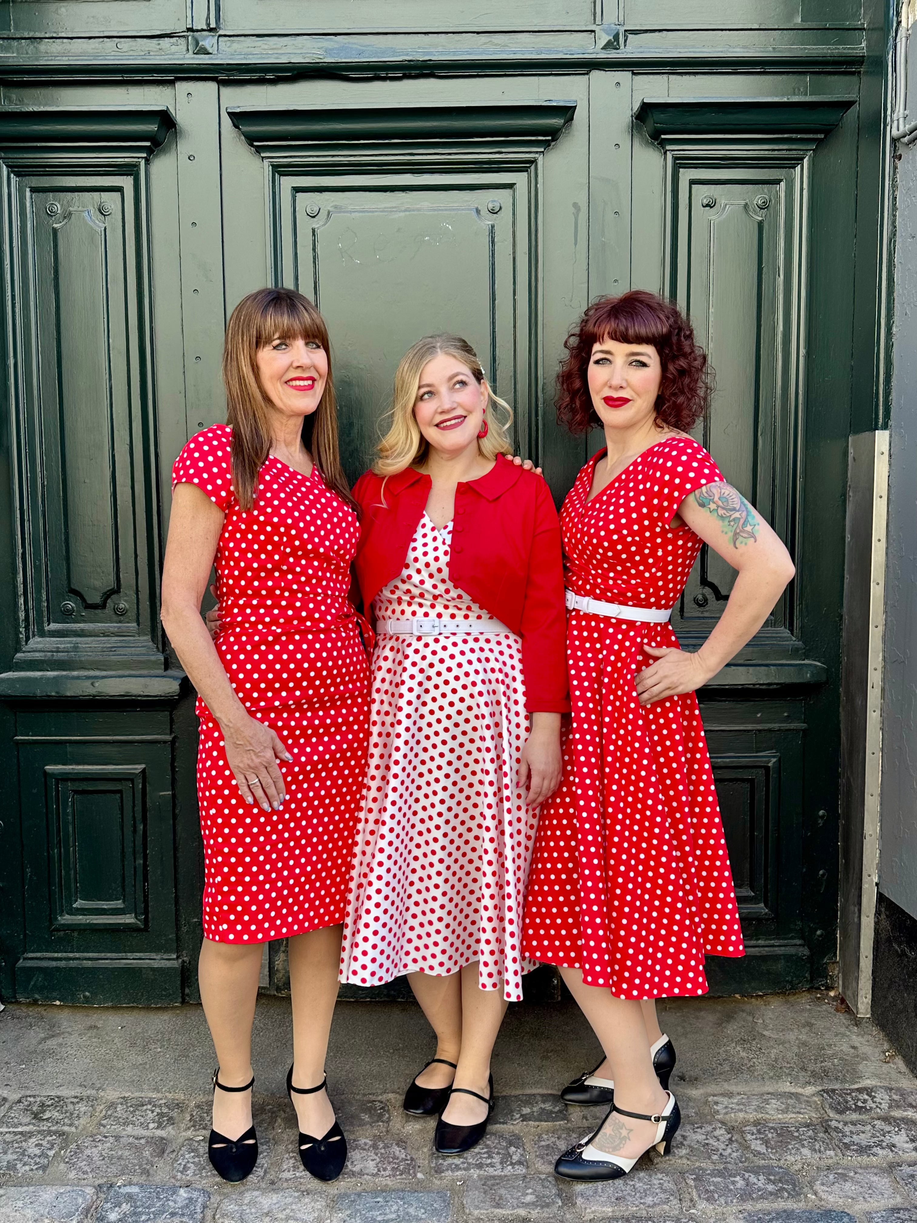 Hourglass swing dress in white with red polka dots from Pretty Dress Company