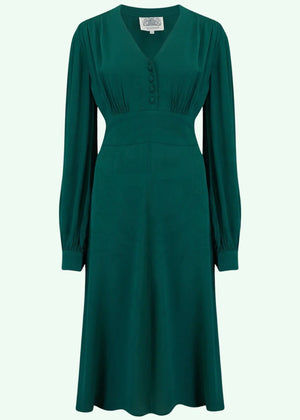 Buy vintage style 1940s dress with flowers and bow tie. Buy vintage style 1940s dress with flowers and bow tie.